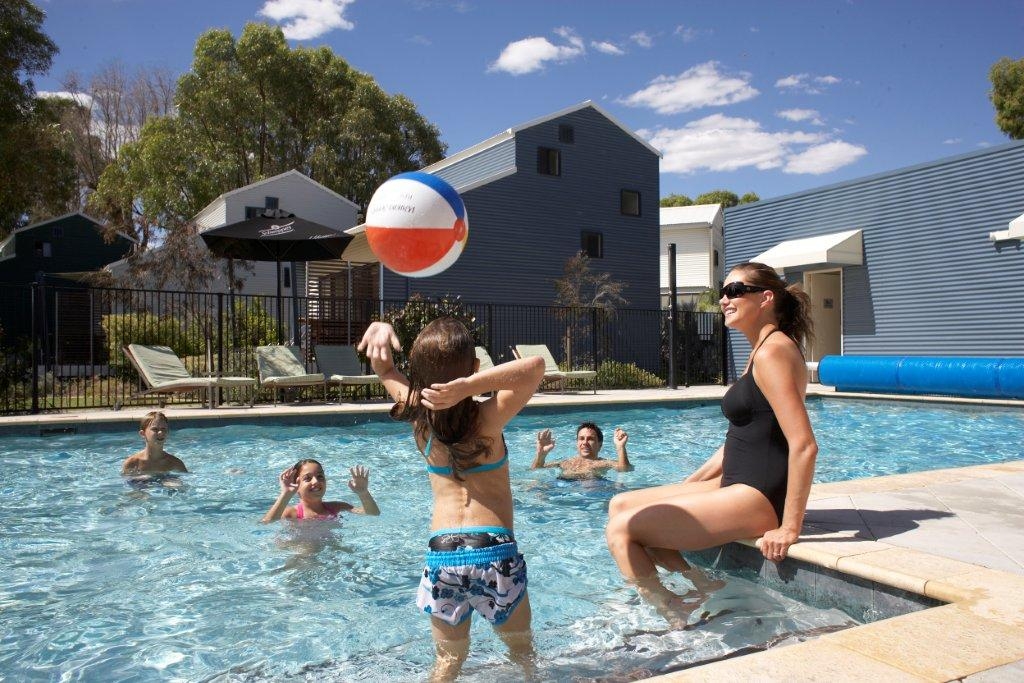 Picture of Family by the pool at Footprints Preston Beach.