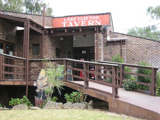 Picture of the front of Lakeclifton Tavern with ramp leading to entrance.
